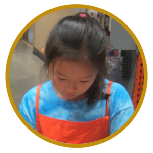 Girl working on science project